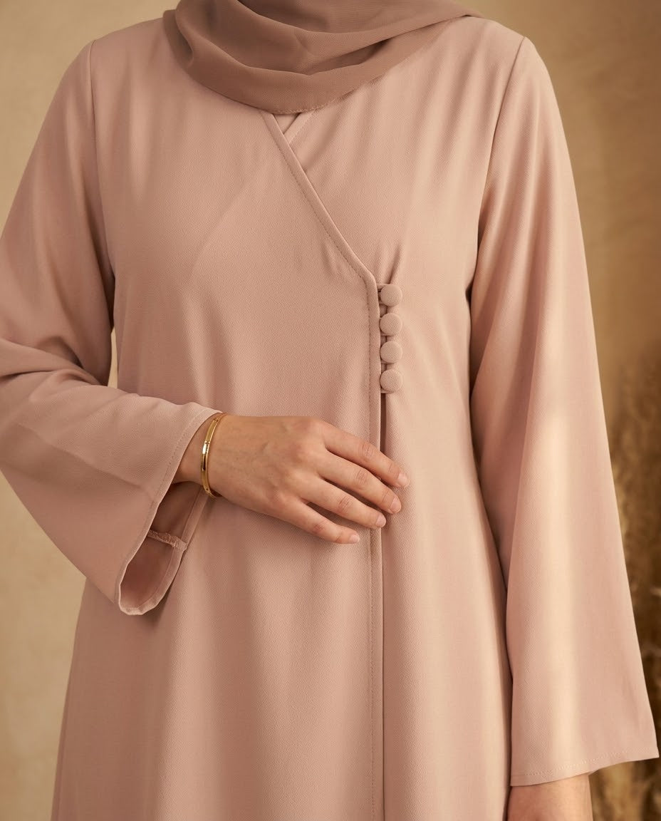 Blush side button abaya, flowing sleeve detail