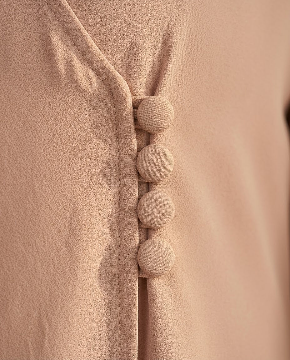 Blush side button abaya, seated pose
