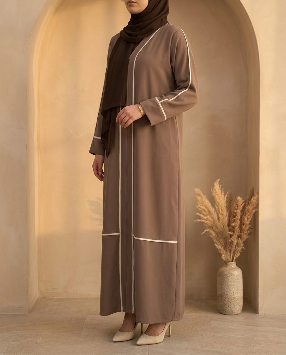 Mocha zip abaya with cream piping, styled view